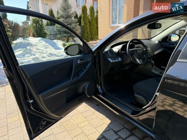 Чорний Мазда 3, об'ємом двигуна 2 л та пробігом 193 тис. км за 8762 $, фото 15 на Automoto.ua