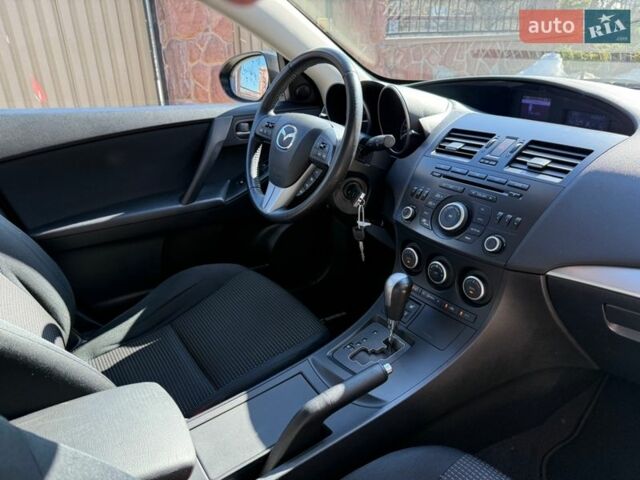 Чорний Мазда 3, об'ємом двигуна 2 л та пробігом 193 тис. км за 8762 $, фото 62 на Automoto.ua