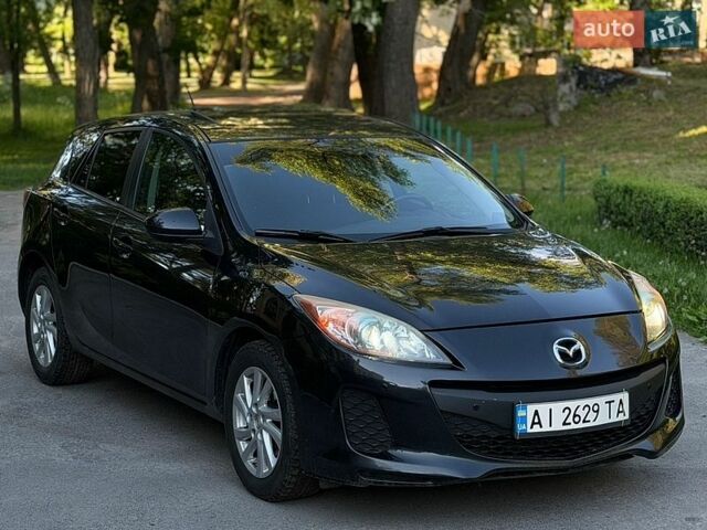 Черный Мазда 3, объемом двигателя 2 л и пробегом 275 тыс. км за 7500 $, фото 6 на Automoto.ua
