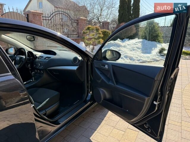 Чорний Мазда 3, об'ємом двигуна 2 л та пробігом 193 тис. км за 8762 $, фото 55 на Automoto.ua