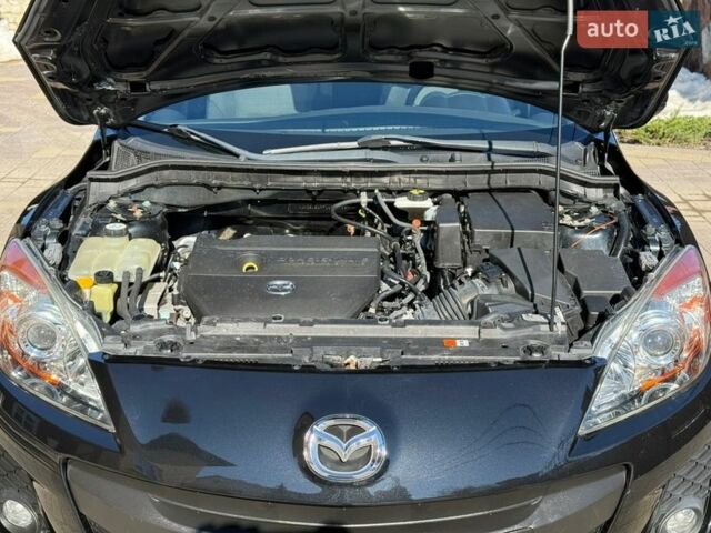 Чорний Мазда 3, об'ємом двигуна 2 л та пробігом 193 тис. км за 8762 $, фото 65 на Automoto.ua