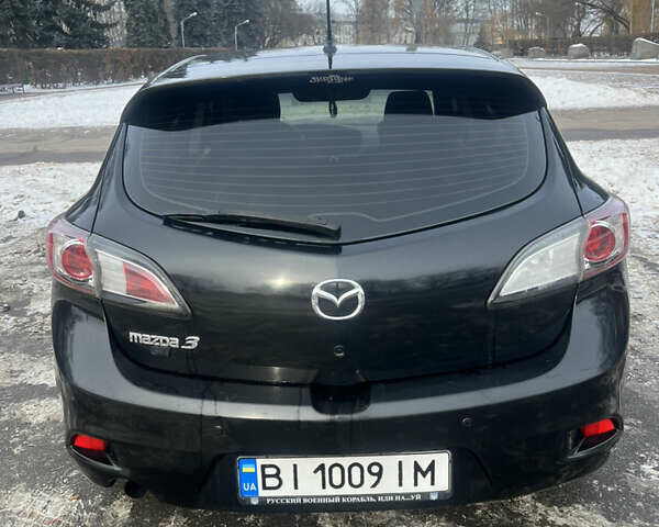Чорний Мазда 3, об'ємом двигуна 1.6 л та пробігом 220 тис. км за 6959 $, фото 7 на Automoto.ua
