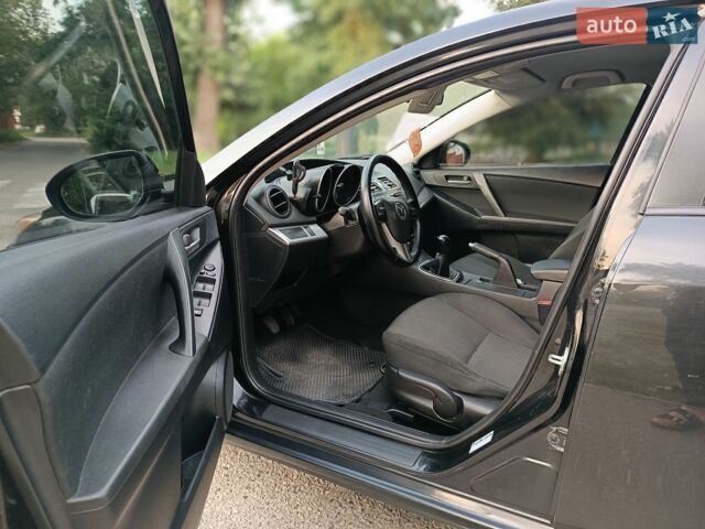 Чорний Мазда 3, об'ємом двигуна 1.6 л та пробігом 280 тис. км за 5750 $, фото 11 на Automoto.ua
