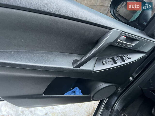 Чорний Мазда 3, об'ємом двигуна 1.6 л та пробігом 220 тис. км за 6959 $, фото 14 на Automoto.ua