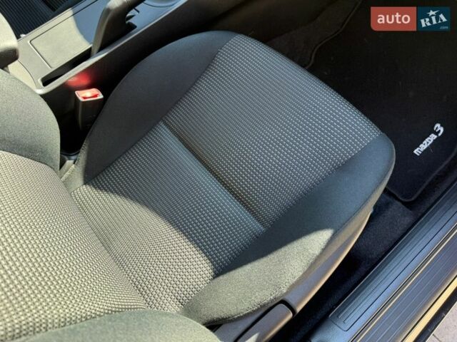 Чорний Мазда 3, об'ємом двигуна 2 л та пробігом 193 тис. км за 8762 $, фото 60 на Automoto.ua