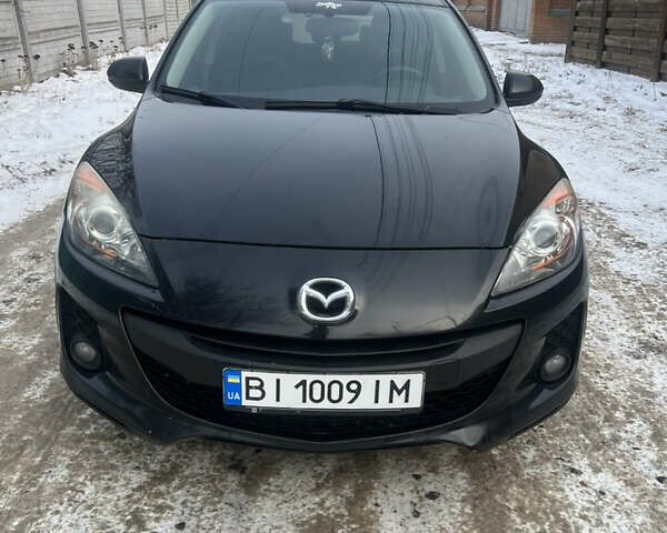 Чорний Мазда 3, об'ємом двигуна 1.6 л та пробігом 220 тис. км за 6959 $, фото 23 на Automoto.ua