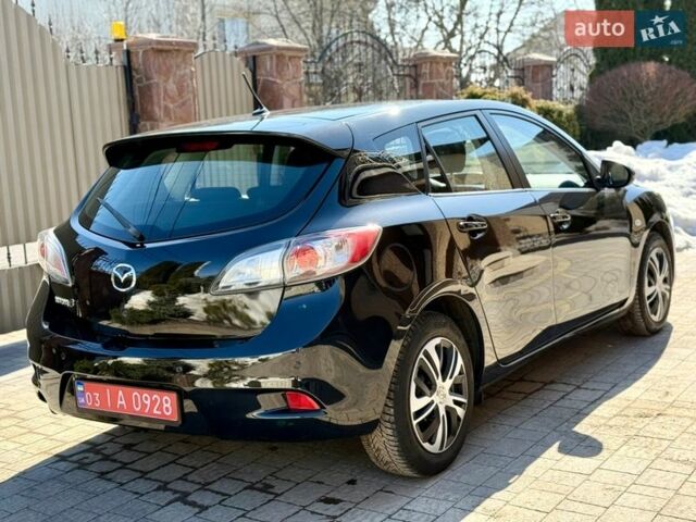 Чорний Мазда 3, об'ємом двигуна 2 л та пробігом 193 тис. км за 8762 $, фото 8 на Automoto.ua