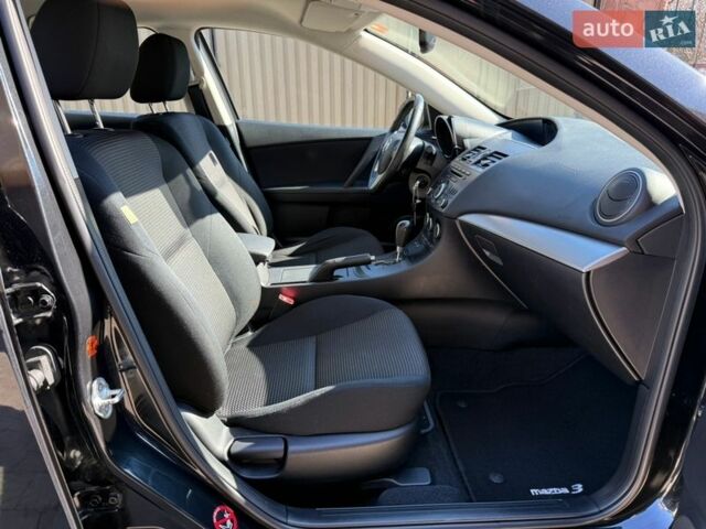 Чорний Мазда 3, об'ємом двигуна 2 л та пробігом 193 тис. км за 8762 $, фото 58 на Automoto.ua