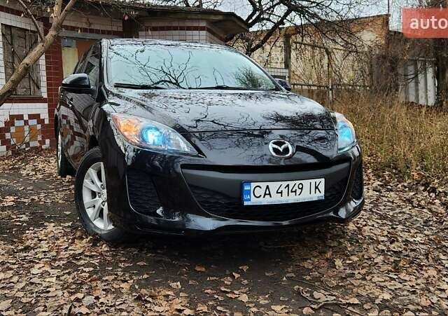 Черный Мазда 3, объемом двигателя 2 л и пробегом 240 тыс. км за 8450 $, фото 6 на Automoto.ua