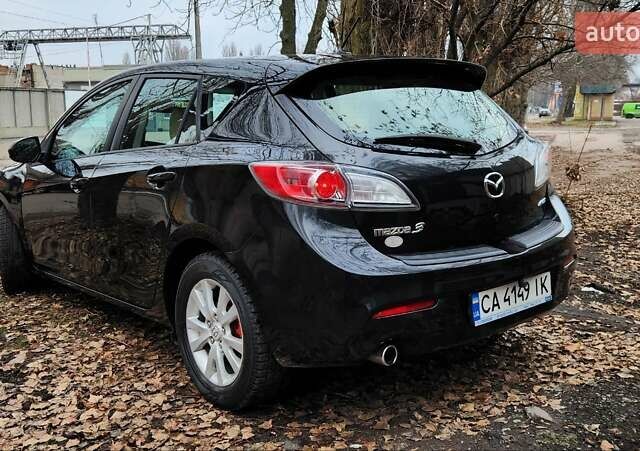 Черный Мазда 3, объемом двигателя 2 л и пробегом 240 тыс. км за 8450 $, фото 5 на Automoto.ua