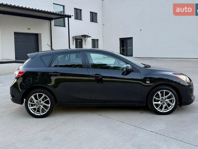 Черный Мазда 3, объемом двигателя 2 л и пробегом 169 тыс. км за 9500 $, фото 3 на Automoto.ua