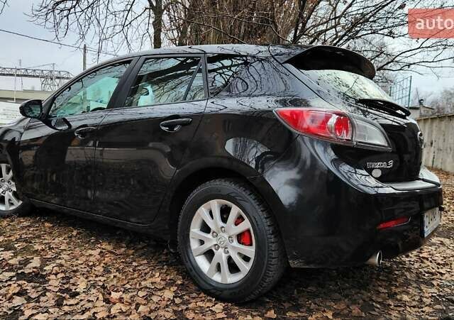Черный Мазда 3, объемом двигателя 2 л и пробегом 240 тыс. км за 8450 $, фото 1 на Automoto.ua