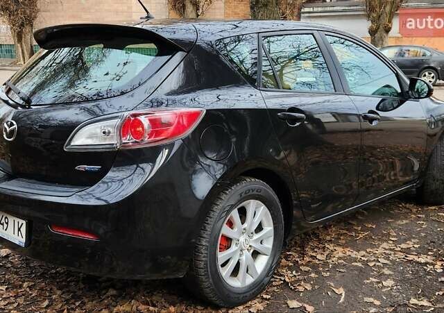 Черный Мазда 3, объемом двигателя 2 л и пробегом 240 тыс. км за 8450 $, фото 2 на Automoto.ua