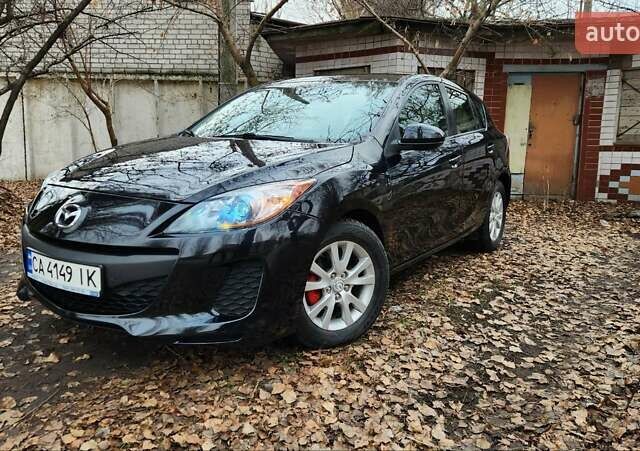 Черный Мазда 3, объемом двигателя 2 л и пробегом 240 тыс. км за 8450 $, фото 4 на Automoto.ua