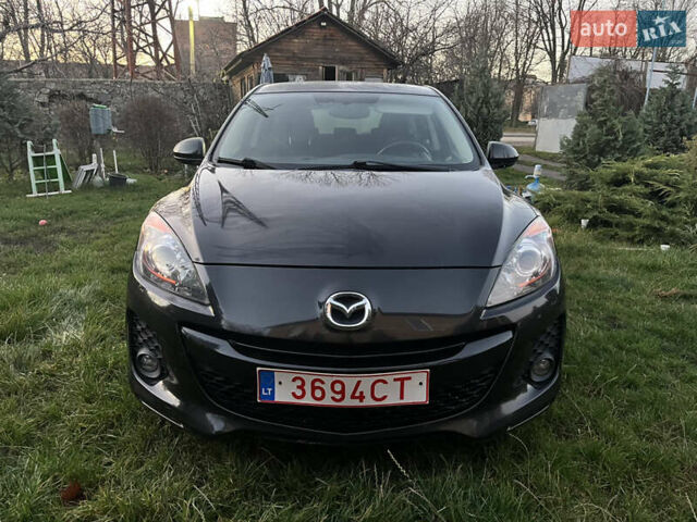 Черный Мазда 3, объемом двигателя 1.6 л и пробегом 211 тыс. км за 3900 $, фото 1 на Automoto.ua