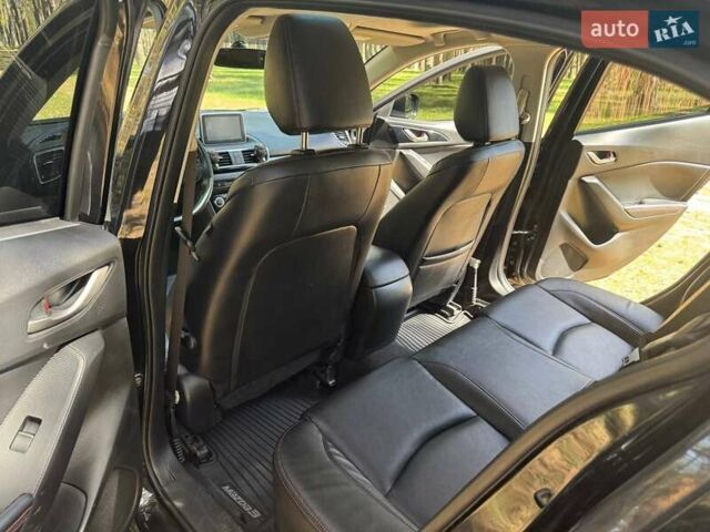 Черный Мазда 3, объемом двигателя 2 л и пробегом 231 тыс. км за 11900 $, фото 21 на Automoto.ua