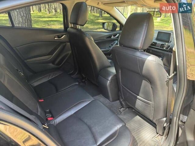 Черный Мазда 3, объемом двигателя 2 л и пробегом 231 тыс. км за 11900 $, фото 17 на Automoto.ua