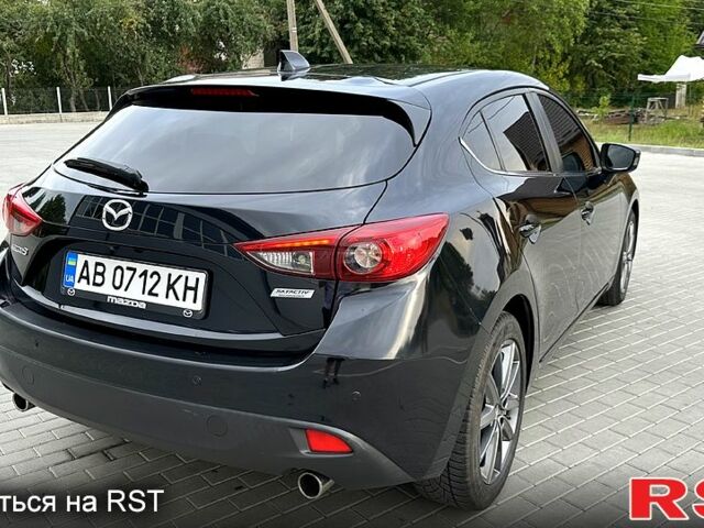 Черный Мазда 3, объемом двигателя 2 л и пробегом 199 тыс. км за 8500 $, фото 4 на Automoto.ua