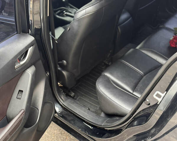 Черный Мазда 3, объемом двигателя 2 л и пробегом 230 тыс. км за 9650 $, фото 12 на Automoto.ua