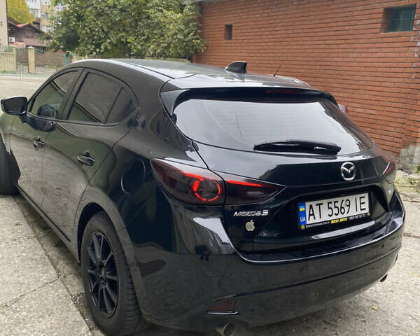 Чорний Мазда 3, об'ємом двигуна 2 л та пробігом 226 тис. км за 8999 $, фото 4 на Automoto.ua