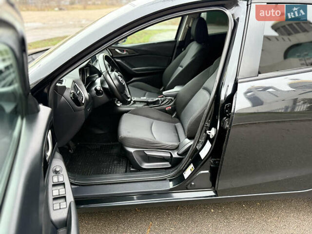 Черный Мазда 3, объемом двигателя 2 л и пробегом 229 тыс. км за 9450 $, фото 13 на Automoto.ua