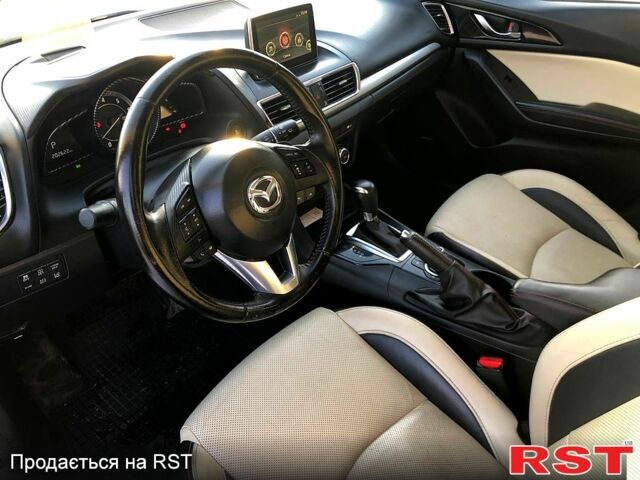 Чорний Мазда 3, об'ємом двигуна 2.2 л та пробігом 20200 тис. км за 11700 $, фото 7 на Automoto.ua