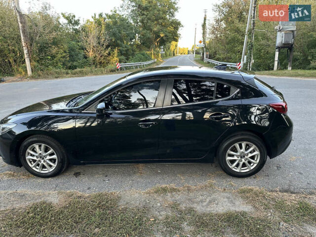 Чорний Мазда 3, об'ємом двигуна 2 л та пробігом 145 тис. км за 13650 $, фото 15 на Automoto.ua