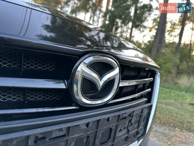 Чорний Мазда 3, об'ємом двигуна 2 л та пробігом 145 тис. км за 13650 $, фото 25 на Automoto.ua