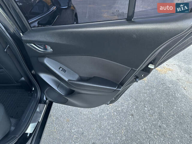Чорний Мазда 3, об'ємом двигуна 2 л та пробігом 145 тис. км за 13650 $, фото 49 на Automoto.ua