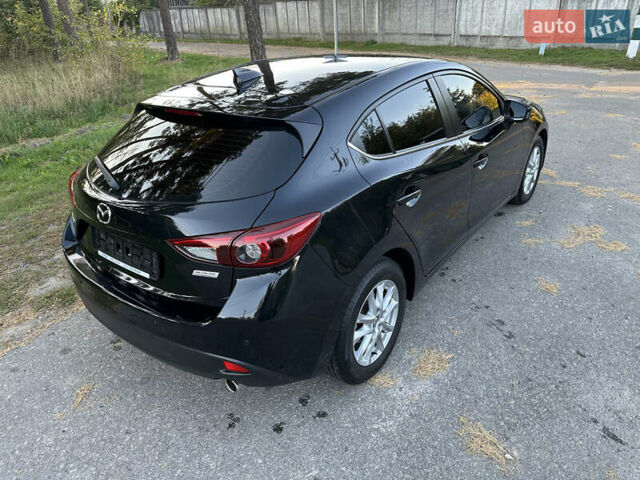 Чорний Мазда 3, об'ємом двигуна 2 л та пробігом 145 тис. км за 13650 $, фото 12 на Automoto.ua