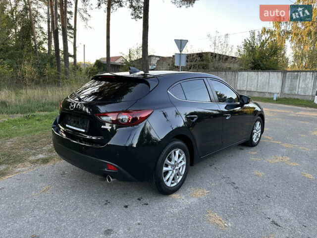 Чорний Мазда 3, об'ємом двигуна 2 л та пробігом 145 тис. км за 13650 $, фото 4 на Automoto.ua