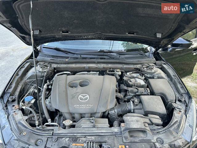 Черный Мазда 3, объемом двигателя 2 л и пробегом 143 тыс. км за 13850 $, фото 28 на Automoto.ua