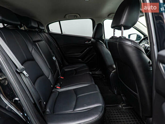 Черный Мазда 3, объемом двигателя 2 л и пробегом 104 тыс. км за 12390 $, фото 18 на Automoto.ua