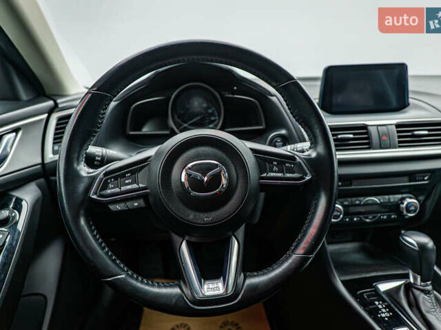 Черный Мазда 3, объемом двигателя 2 л и пробегом 104 тыс. км за 12390 $, фото 10 на Automoto.ua