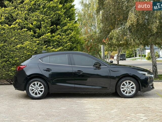 Чорний Мазда 3, об'ємом двигуна 2 л та пробігом 107 тис. км за 13300 $, фото 5 на Automoto.ua