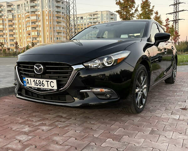 Черный Мазда 3, объемом двигателя 2.49 л и пробегом 88 тыс. км за 14899 $, фото 44 на Automoto.ua