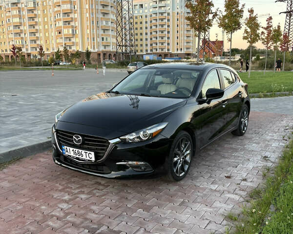 Черный Мазда 3, объемом двигателя 2.49 л и пробегом 88 тыс. км за 14899 $, фото 1 на Automoto.ua