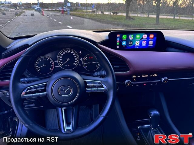 Чорний Мазда 3, об'ємом двигуна 2.5 л та пробігом 78 тис. км за 18900 $, фото 12 на Automoto.ua