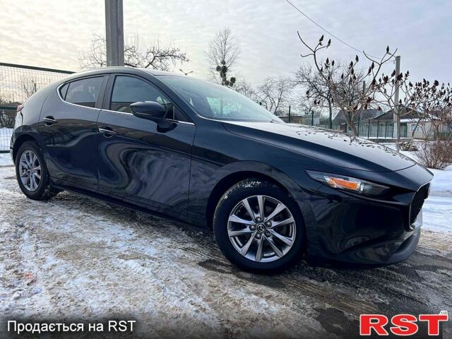 Чорний Мазда 3, об'ємом двигуна 2 л та пробігом 69 тис. км за 15500 $, фото 4 на Automoto.ua