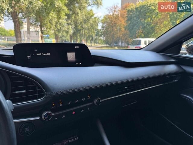 Чорний Мазда 3, об'ємом двигуна 2 л та пробігом 75 тис. км за 14777 $, фото 20 на Automoto.ua