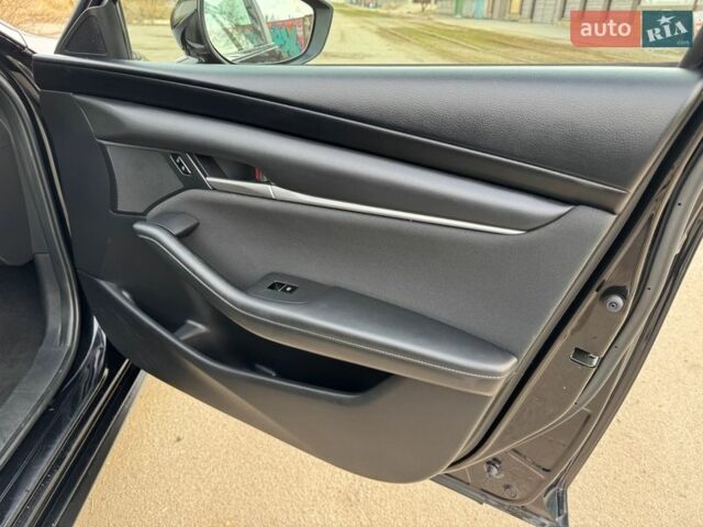 Чорний Мазда 3, об'ємом двигуна 2 л та пробігом 73 тис. км за 15900 $, фото 13 на Automoto.ua