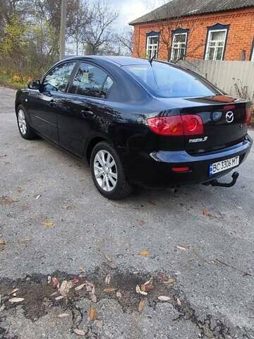 Черный Мазда 3, объемом двигателя 1.6 л и пробегом 218 тыс. км за 4450 $, фото 3 на Automoto.ua