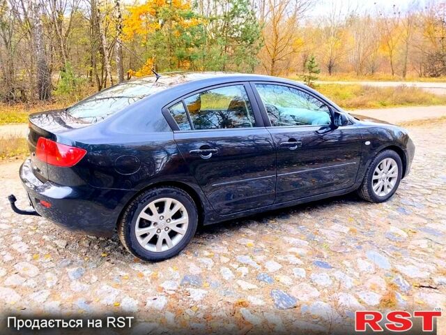 Черный Мазда 3, объемом двигателя 1.6 л и пробегом 218 тыс. км за 4450 $, фото 2 на Automoto.ua