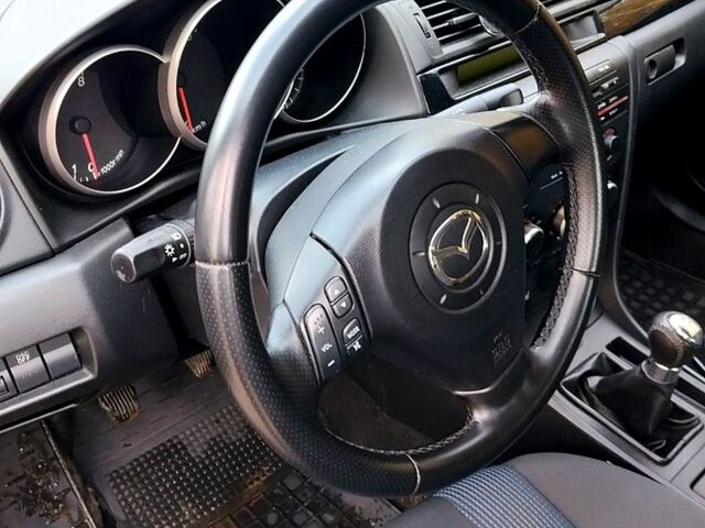 Черный Мазда 3, объемом двигателя 1.6 л и пробегом 218 тыс. км за 4450 $, фото 6 на Automoto.ua