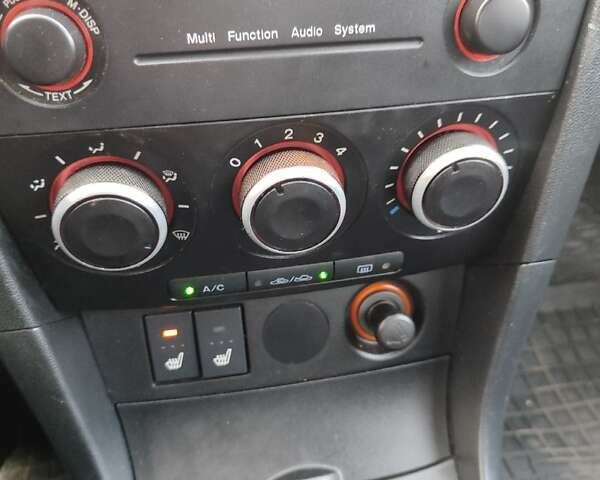 Черный Мазда 3, объемом двигателя 1.6 л и пробегом 218 тыс. км за 4450 $, фото 18 на Automoto.ua