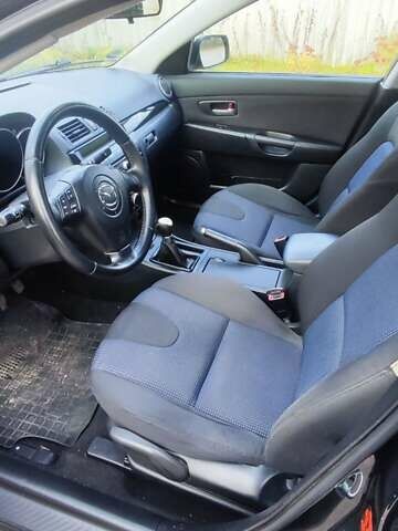 Черный Мазда 3, объемом двигателя 1.6 л и пробегом 218 тыс. км за 4450 $, фото 1 на Automoto.ua