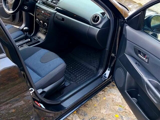 Черный Мазда 3, объемом двигателя 1.6 л и пробегом 218 тыс. км за 4450 $, фото 4 на Automoto.ua