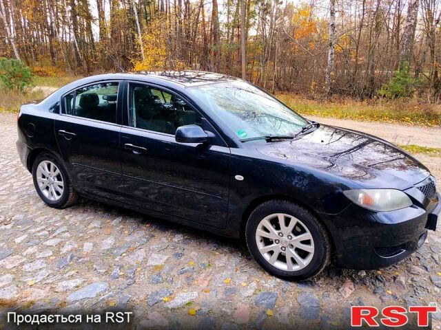 Черный Мазда 3, объемом двигателя 1.6 л и пробегом 218 тыс. км за 4450 $, фото 1 на Automoto.ua