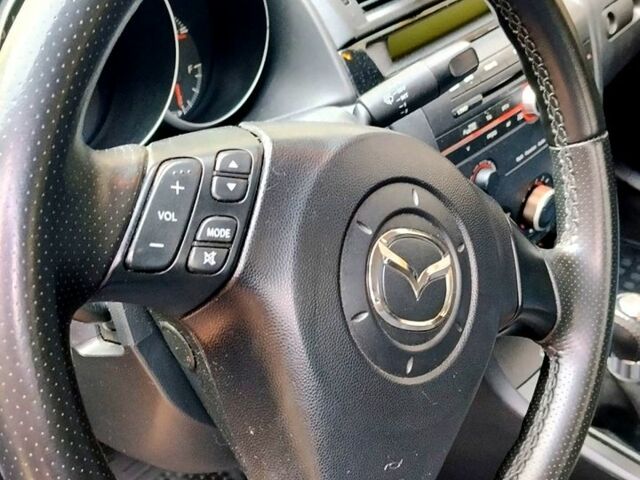 Черный Мазда 3, объемом двигателя 1.6 л и пробегом 218 тыс. км за 4450 $, фото 5 на Automoto.ua