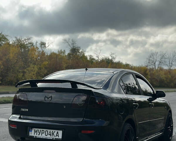 Черный Мазда 3, объемом двигателя 2 л и пробегом 188 тыс. км за 5700 $, фото 2 на Automoto.ua